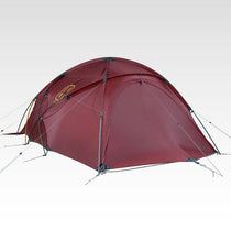 The Free Spirits Whisperwind S red dome tent low angle, crossed DAC poles and side guylines with logo on the flysheet.