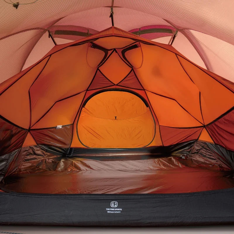 The Free Spirits Whisperwind S orange inner tent interior, breathable mesh ceiling and warm orange walls for two, floor logo.