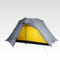 The Free Spirits Vista Tent in Rock Gray 20D, door open revealing the yellow inner tent on a white background.